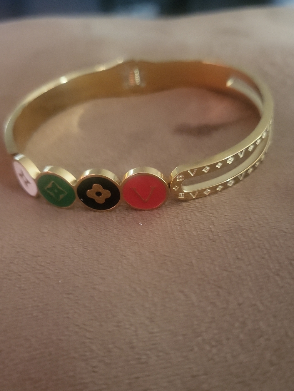 Gold Tone Bracelet.